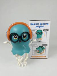 Blue dancing jellyfish toy with orange headphones and black glasses beside its retail packaging.