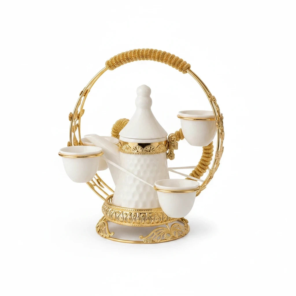 Trendiest traditional Arabic coffee pot and cup set in white ceramic with gold honeycomb accents and ornate metal stand