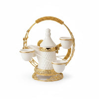 Trendiest traditional Arabic coffee pot and cup set in white ceramic with gold honeycomb accents and ornate metal stand
