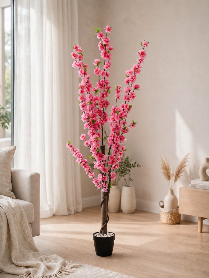 Trendiest 160cm artificial cherry blossom tree with vibrant pink flowers in a black pot, styled in a bright living room