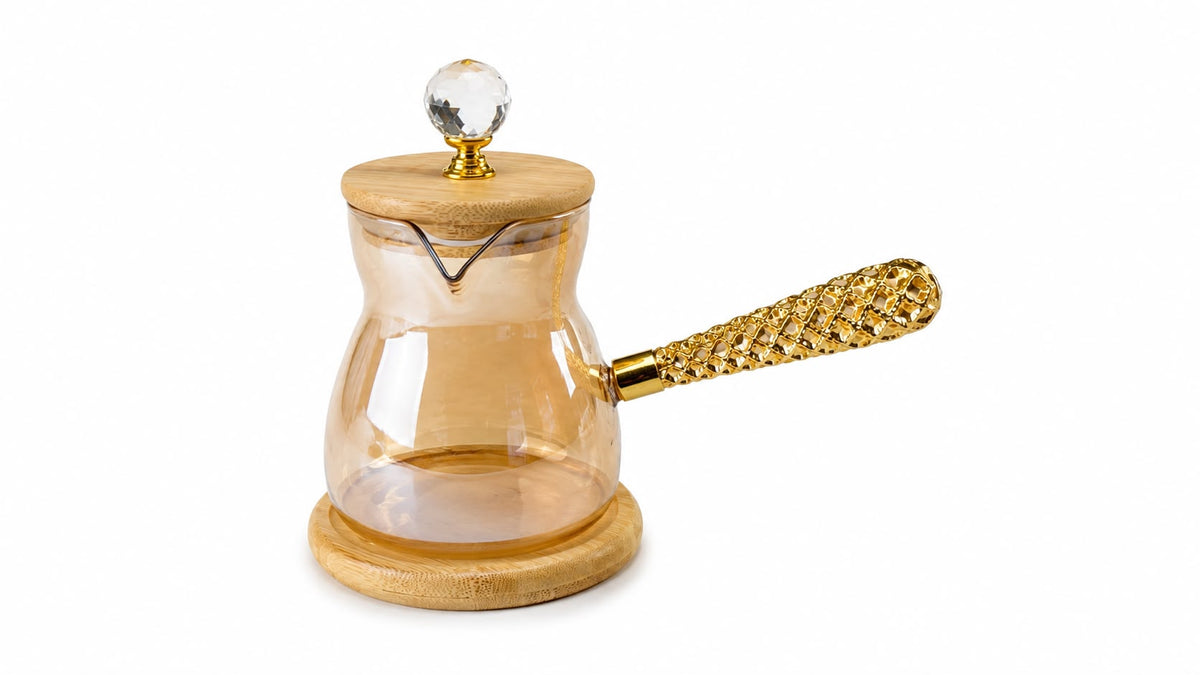 Trendiest borosilicate glass coffee pot with amber tint, bamboo lid, crystal knob, and textured gold-toned handle.
