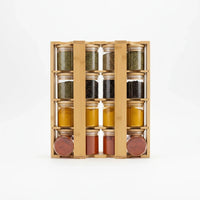 Trendiest bamboo spice rack with 16 clear glass jars and matching wooden lids for organized kitchen storage