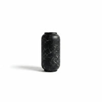 Trendiest ceramic vase with a matte black finish and white marble veining in a sleek cylindrical silhouette