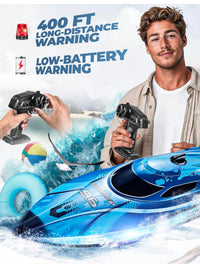 Trendiest blue remote control racing boat with dual-speed modes and safety alerts held by a man at the beach