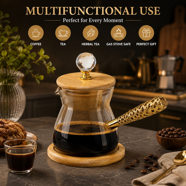 Trendiest borosilicate glass coffee pot with bamboo lid, crystal knob, and ornate gold handle on a bamboo coaster.