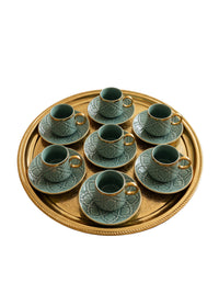 Trendiest decorative ceramic Turkish coffee cup and saucer set with embossed patterns and gold-tone rims on a gold tray