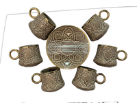 Trendiest ceramic coffee cup and saucer set with embossed geometric patterns and gold-tone rims in a gift box