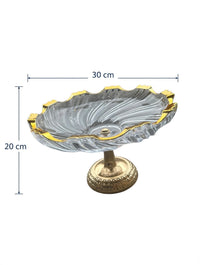 Trendiest decorative glass serving bowl with a gold-tone rim and intricate pedestal base for elegant home decor.