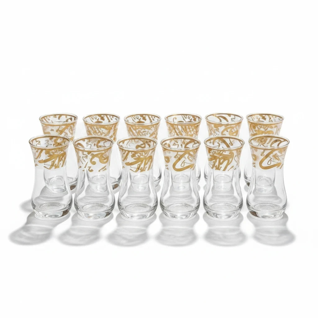 Trendiest set of six clear glass tea cups with elegant gold Arabic calligraphy detailing in a tulip-shaped design.
