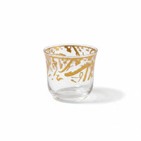 Trendiest clear glass tea cup featuring elegant gold Arabic calligraphy detailing for a luxurious table setting.