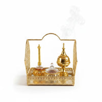 Trendiest gold metal incense burner and perfume tray set with intricate lattice detailing and a mirrored base.
