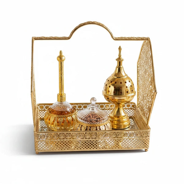 Trendiest gold metal incense burner and perfume tray set with intricate lattice detailing and a mirrored base.