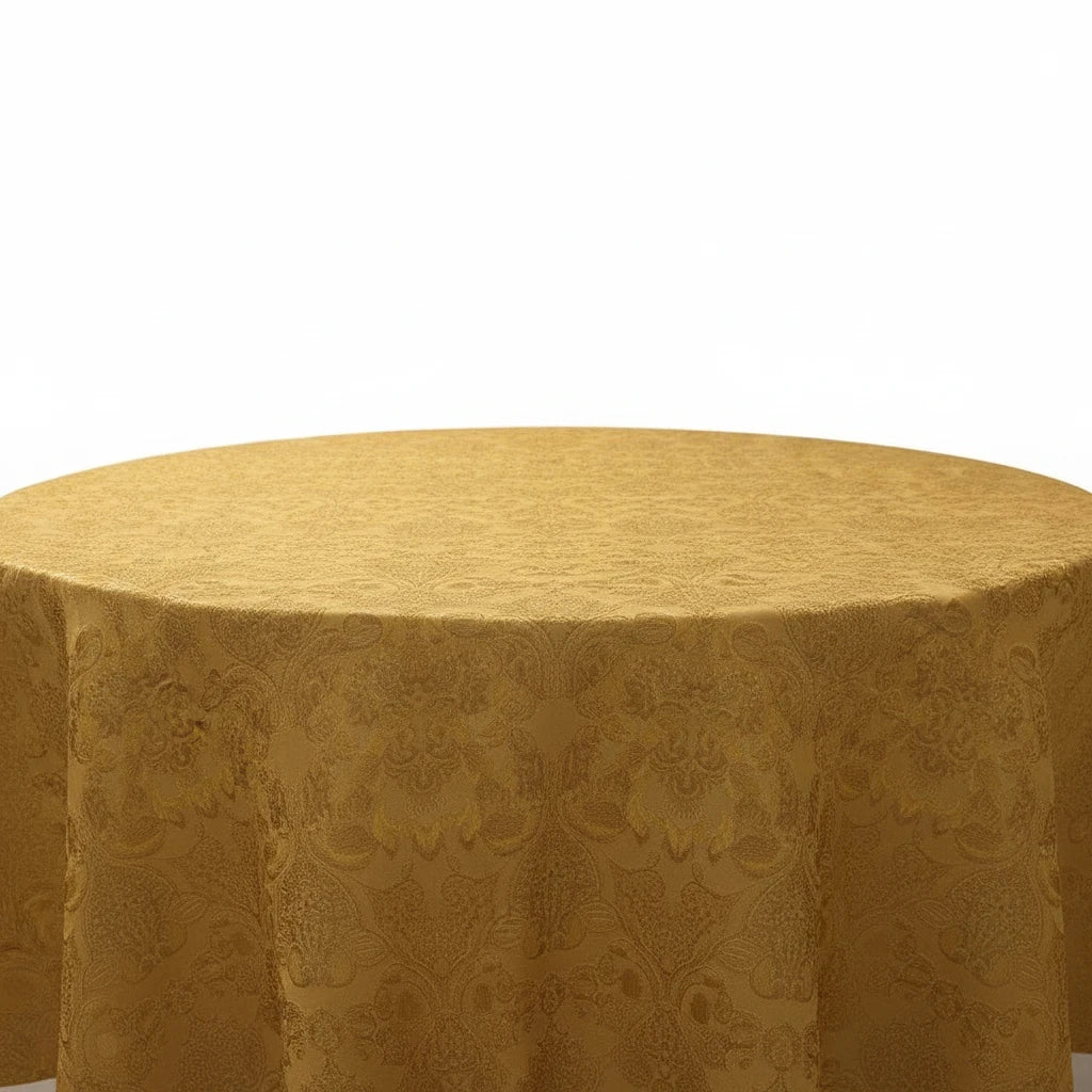 Trendiest gold round tablecloth featuring an intricate textured damask pattern for an elegant dining table setting.