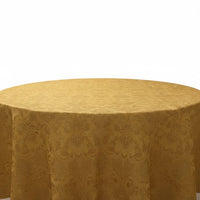 Trendiest gold round tablecloth featuring an intricate textured damask pattern for an elegant dining table setting.