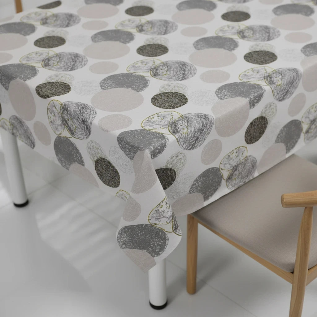Trendiest grey geometric circle patterned tablecloth on a modern rectangular dining table with wooden chairs