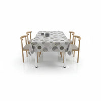 Trendiest modern rectangular dining table set with four chairs and a grey geometric circle patterned tablecloth
