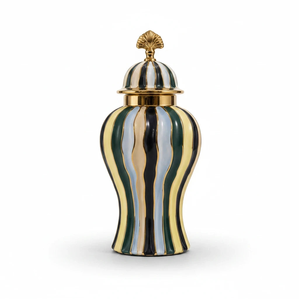 Trendiest hand-painted ceramic urn vase with decorative lid and gold, emerald, navy, and ivory details, close-up view.