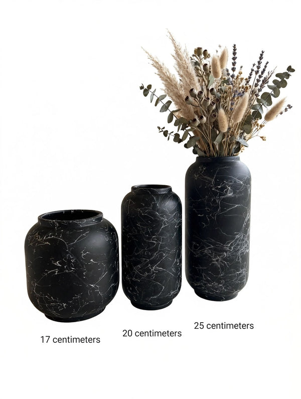 Trendiest set of 3 matte black ceramic vases with white marble veining, featuring varied heights for floral displays.