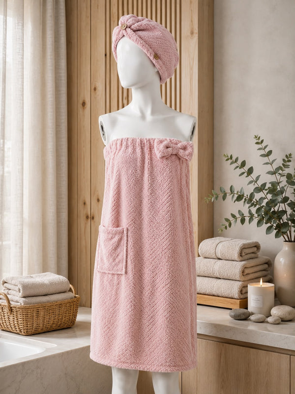 Trendiest pink nanofiber bath skirt and matching shower turban hair wrap on a mannequin in a spa-like bathroom.