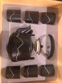 Trendiest high-fired black porcelain tea set with mountain motif, including a teapot and six matching cups in a box.