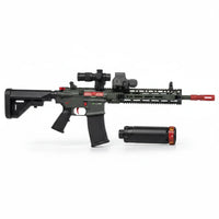 Trendiest target blaster toy with green and red accents, featuring a scope, detachable suppressor, and tactical design.