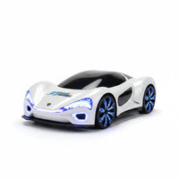 Trendiest white remote control stunt sports car with glowing blue LED wheels and headlights on a white background