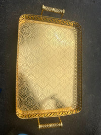 Trendiest XL rectangular gold serving tray with intricate lattice sides and an ornate textured base with handles.